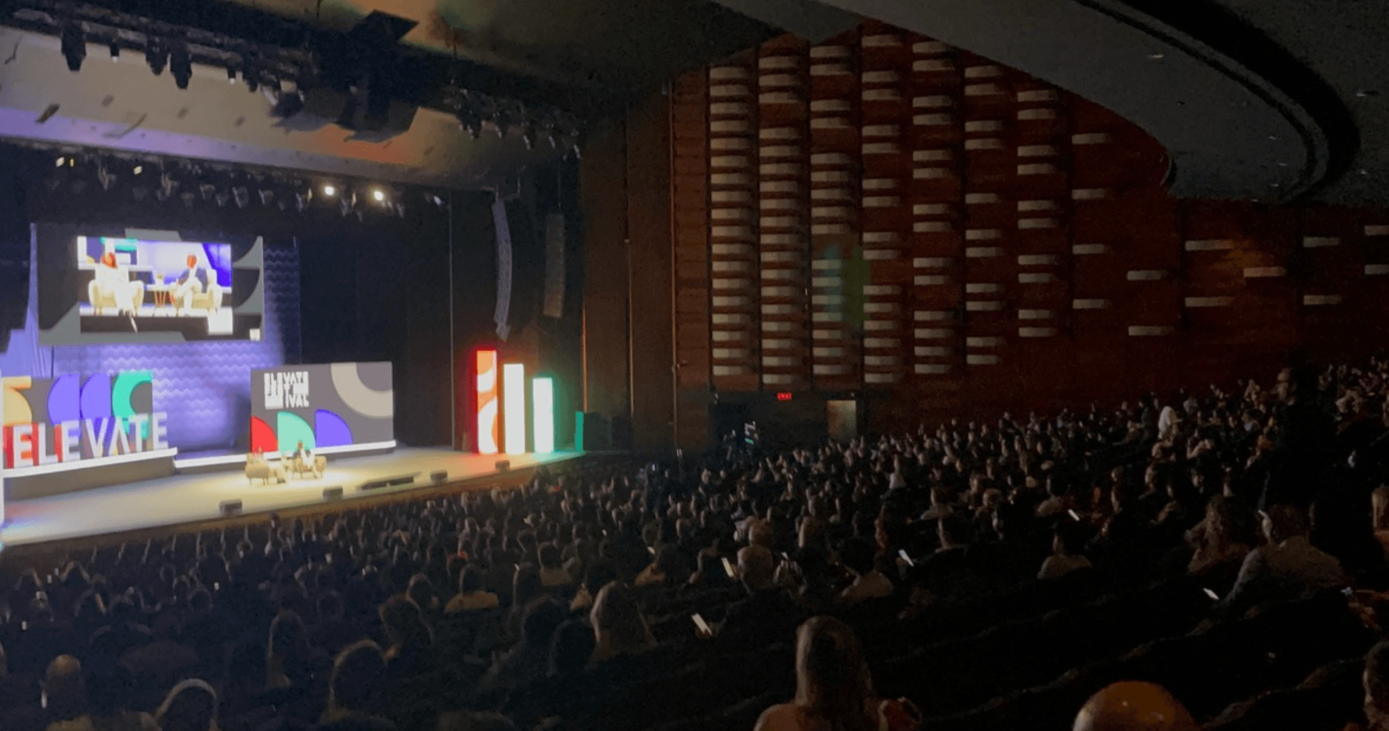 A huge conference hall filled with people